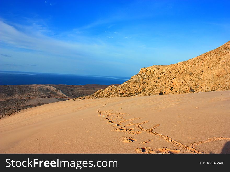 Scenic view to socotra island with blue sky and ocean