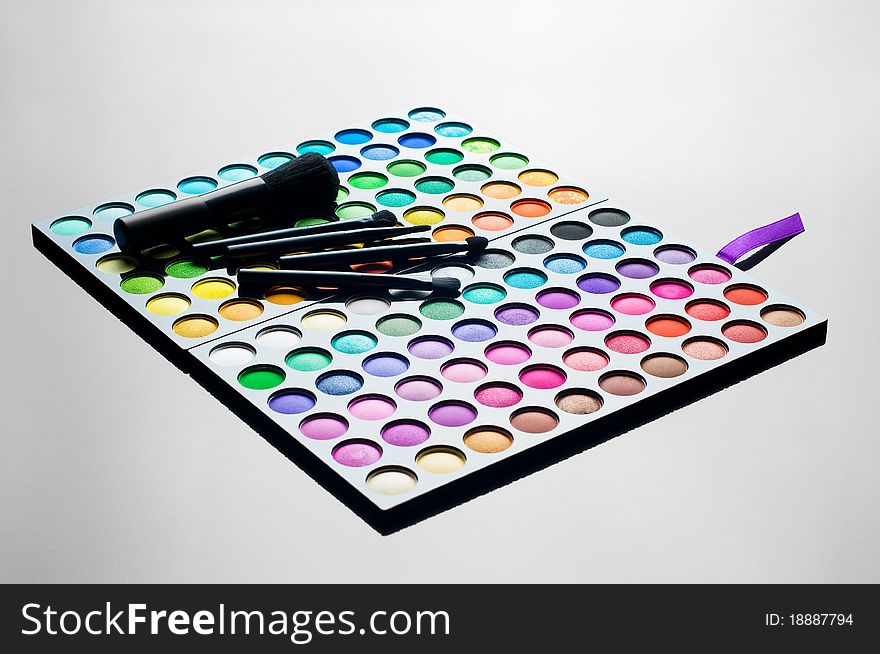 Palette of colorful eye shadows close-up. woman cosmetics.