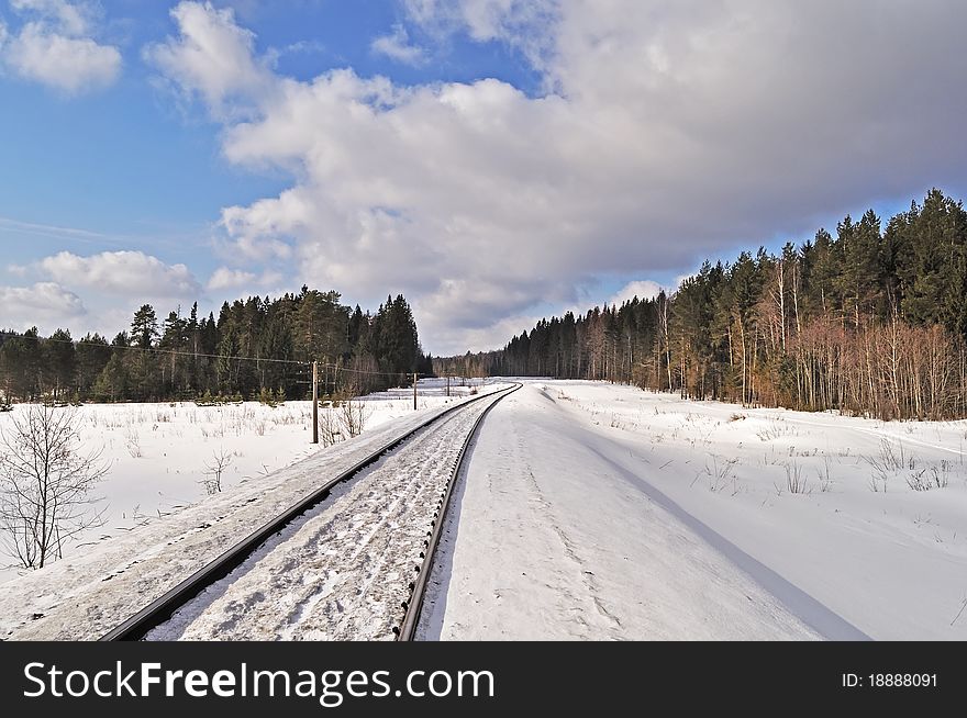 Railroad In Winter Forest