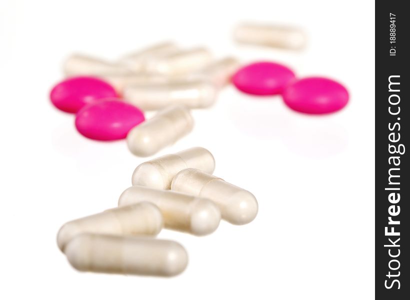 White and pink pills