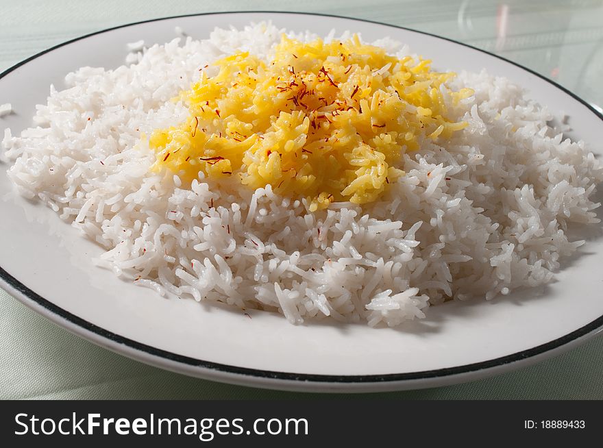 White plate of white and yellow rice