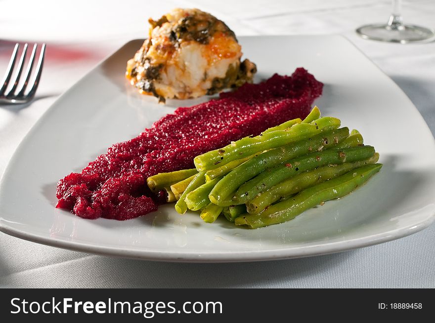 Vegetable plate with vanilla beets, pimento-cheese-mustard-green potato mash, pole beans