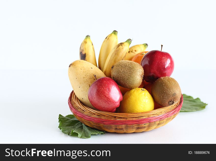 Basket Of Fruits On White