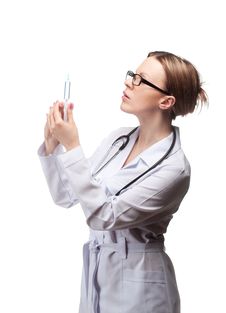 A Young Woman Doctor With A Syringe Stock Photos A Young Woman Doctor With A Syringe Stock Photos