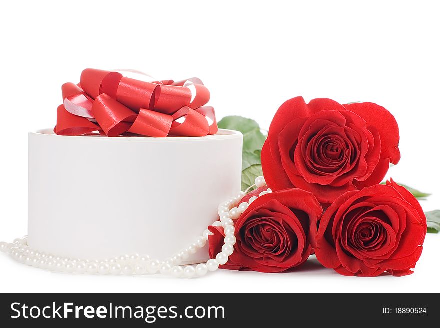 Red rose with a box with a gift