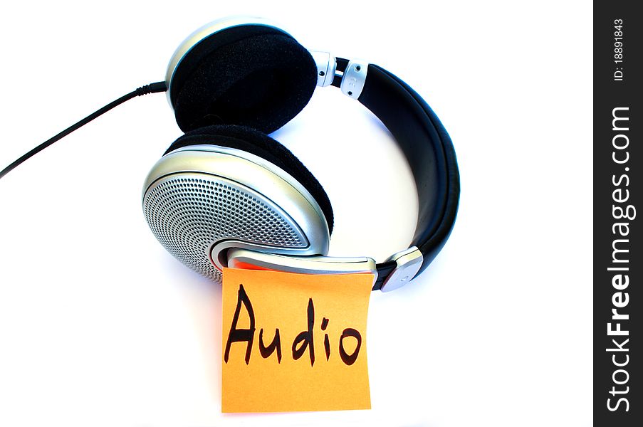 Silver color headphones on a white isolated background