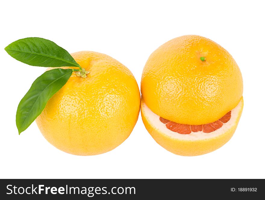 close-up two ripe grapefruits, isolated on white