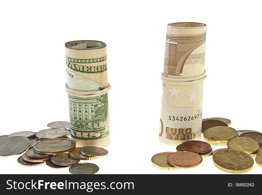 Rolls of euro and dollar on a white background. Rolls of euro and dollar on a white background