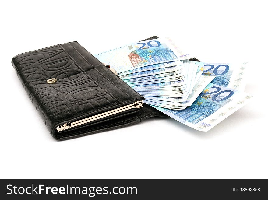 Money in a purse on a white background