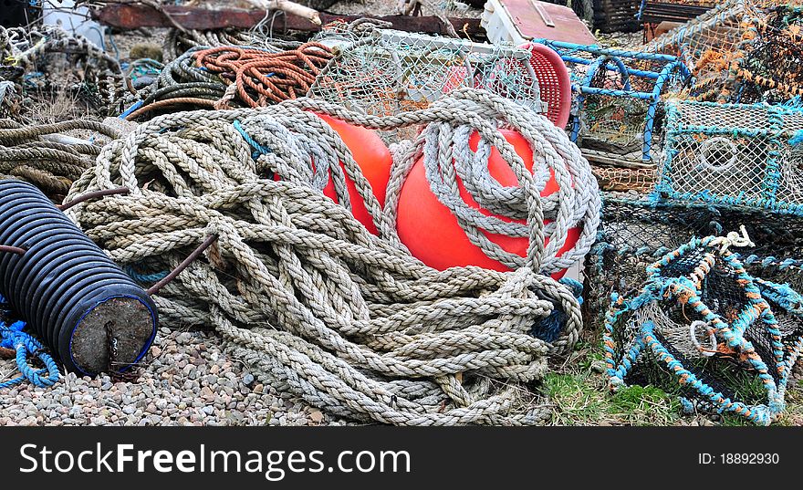 Assortment of Fishing Gear also ropes and buoys. Fishing gear is the tool with which aquatic resources are captured, whereas the fishing method is how the gear is used. Gear also includes harvesting organisms when no particular gear &#x28;tool&#x29; or boat is involved. Furthermore, the same fishing gear can be used in different ways by different fishers. There are two main types of devices used to capture fishes in both marine and inland fisheries: ADVERTISEMENTS: &#x28;1&#x29; Nets or gear â€” these are instruments used for catching fish. &#x28;2&#x29; Crafts or Boats â€” It provides a platform for fishing operations, carrying the crew and fishing gears.