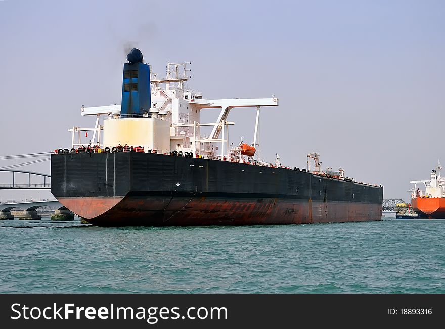Tanker docked at    a dock at Qingdao China. Tanker docked at    a dock at Qingdao China