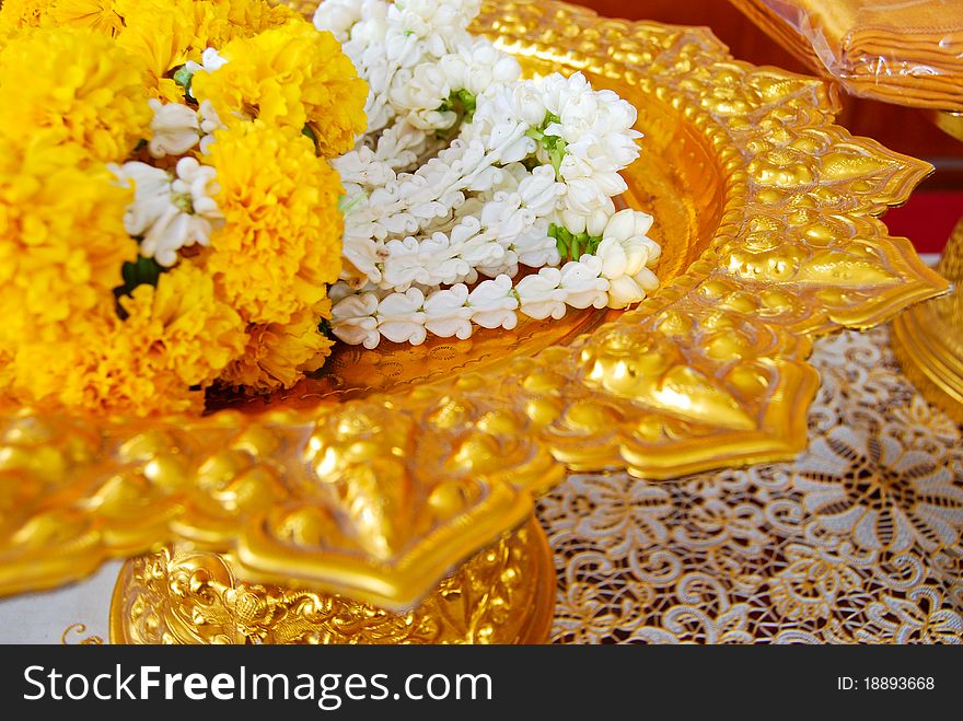 Jasmine garland on gold plate for the worship ceremony