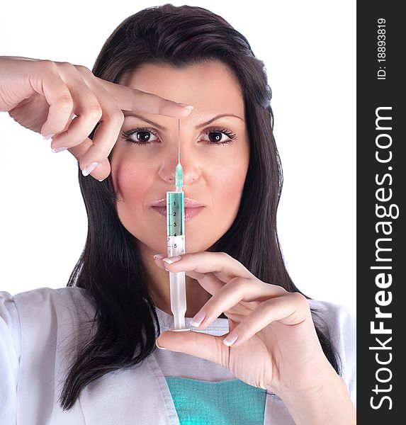 Young doctor women holding injection, isolated. Young doctor women holding injection, isolated
