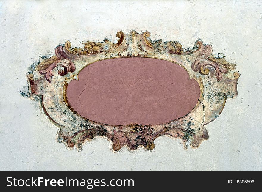 Fresco on a wall, ancient sign of 17 century in Italy