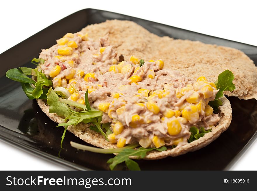 Tuna with corn in a whole wheat pita. Tuna with corn in a whole wheat pita