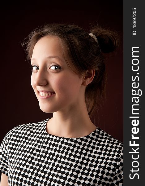 Portrait of a beautiful young woman looking happy