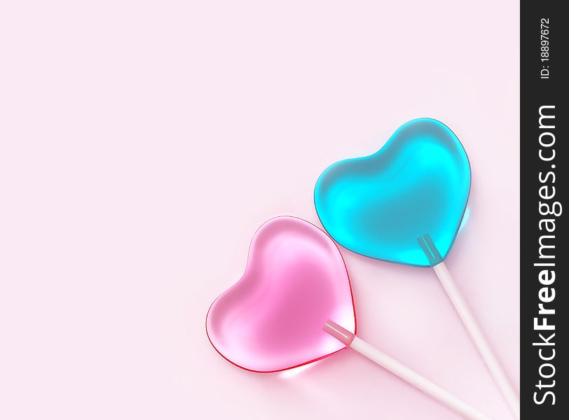 Two heart shaped lollipops on pink background