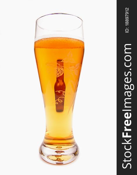 A bottle of beer and mug isolated on white background. A bottle of beer and mug isolated on white background