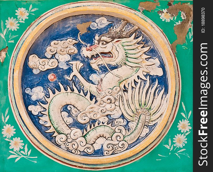 Dragon power pattern on the wall in chinese temple