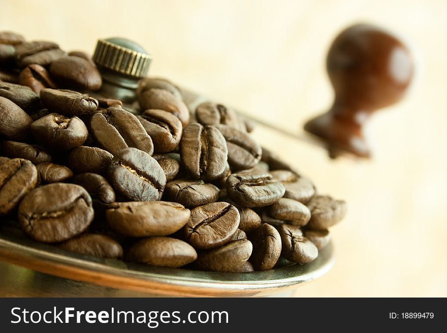 Vintage coffee grinder with coffee beans