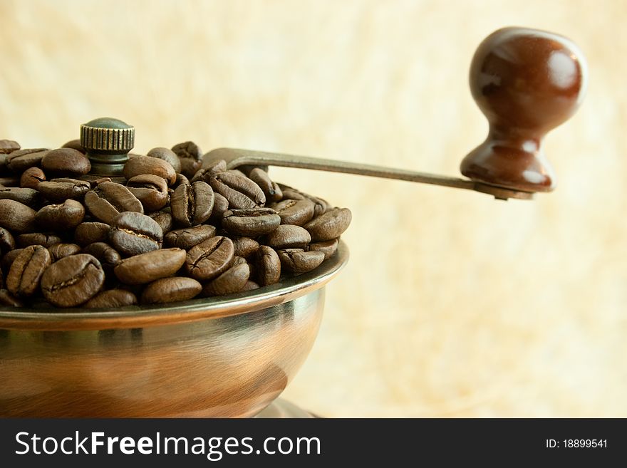 Vintage coffee grinder with coffee beans