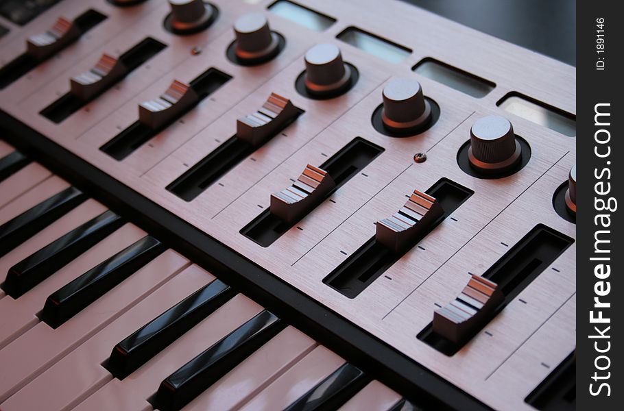 Close-up of a professional usb midi controller. Close-up of a professional usb midi controller.