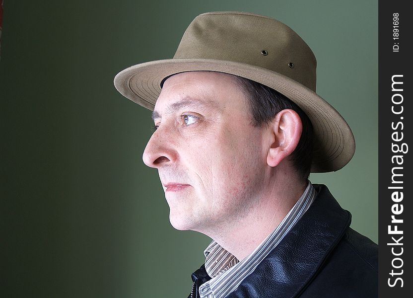 A man wearing a wide rimmed hat. A man wearing a wide rimmed hat.