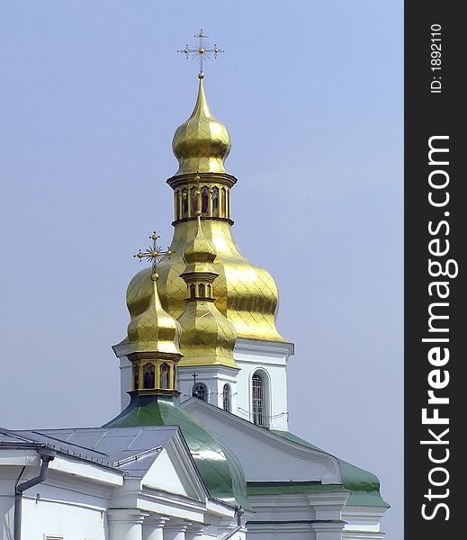 Kiev Pechersk Lavra gold cupola in sky. Kiev Pechersk Lavra gold cupola in sky