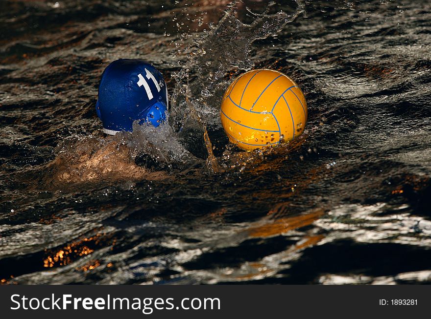 The floating child and ball in water with sparks. The floating child and ball in water with sparks