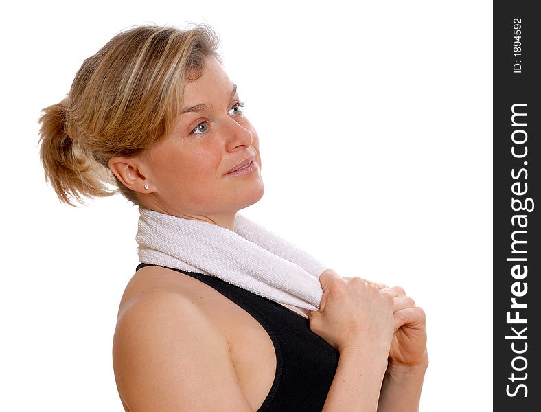 Cute blond woman with a towel around her neck. Cute blond woman with a towel around her neck