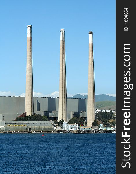 Vertical shot of Electric power plant in Morro bay California. Vertical shot of Electric power plant in Morro bay California