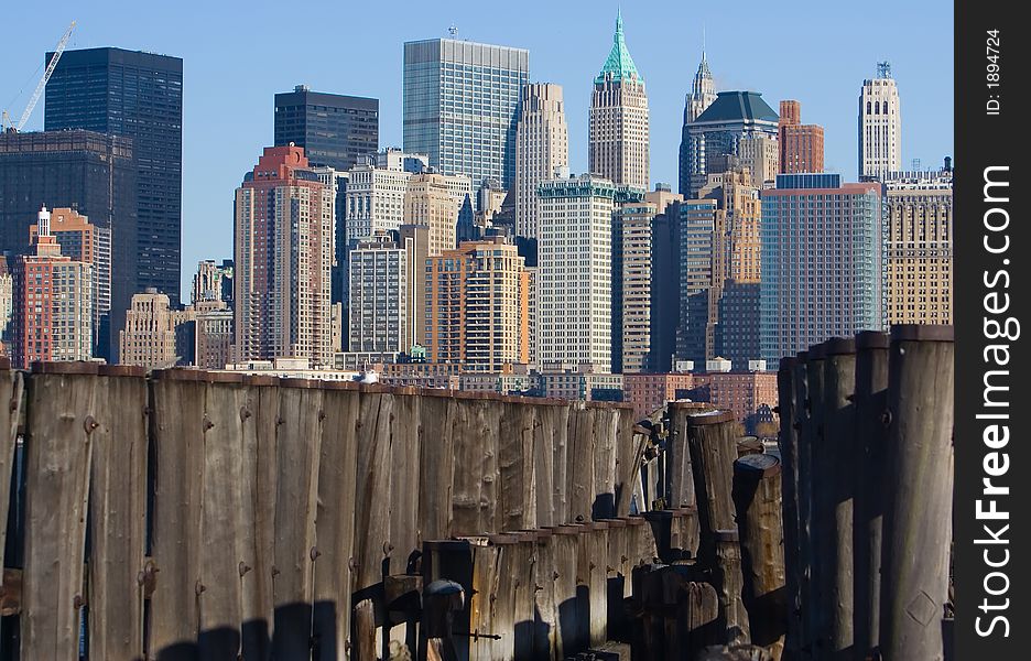 New York Skyline with old pilings in the foreground. New York Skyline with old pilings in the foreground.