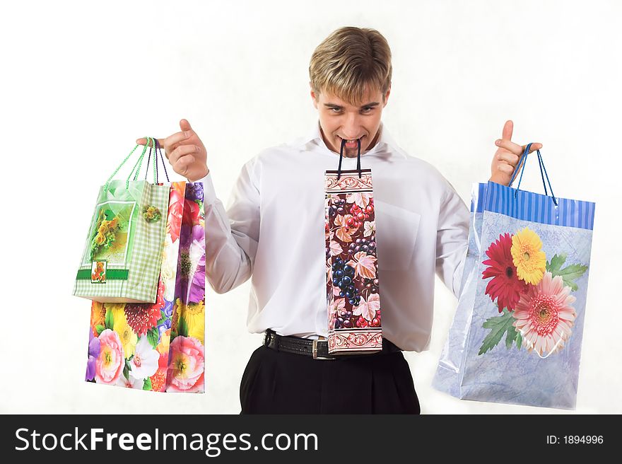 Shopping young man with bags