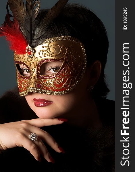 Portrait of attractive beautiful young woman in mask. Portrait of attractive beautiful young woman in mask