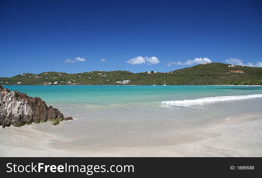 Beautiful caribbean beach with splashing waves. Beautiful caribbean beach with splashing waves