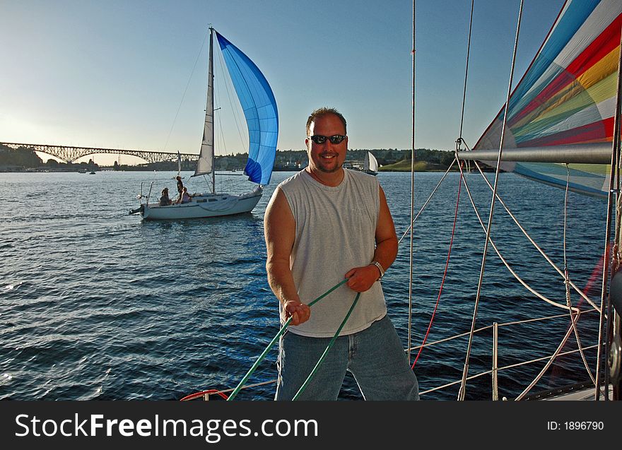Sailboat crew member on Lake Union Seattle, WA
