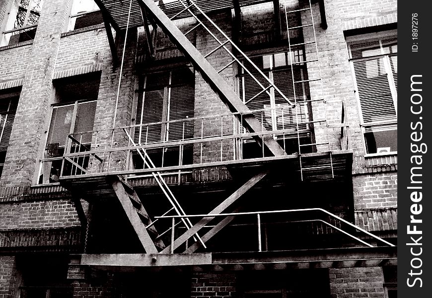 Old fire escape on a tattered college building. Old fire escape on a tattered college building