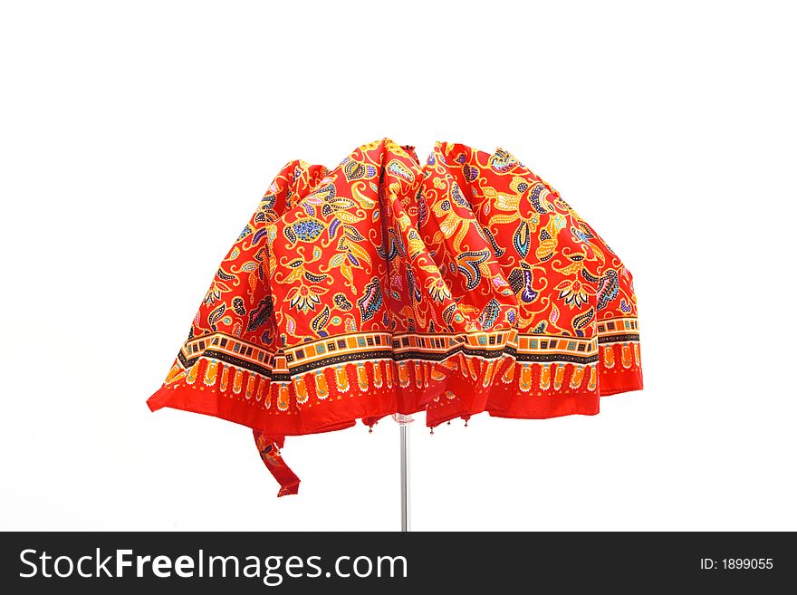 Colorful umbrella helps against rain and sun