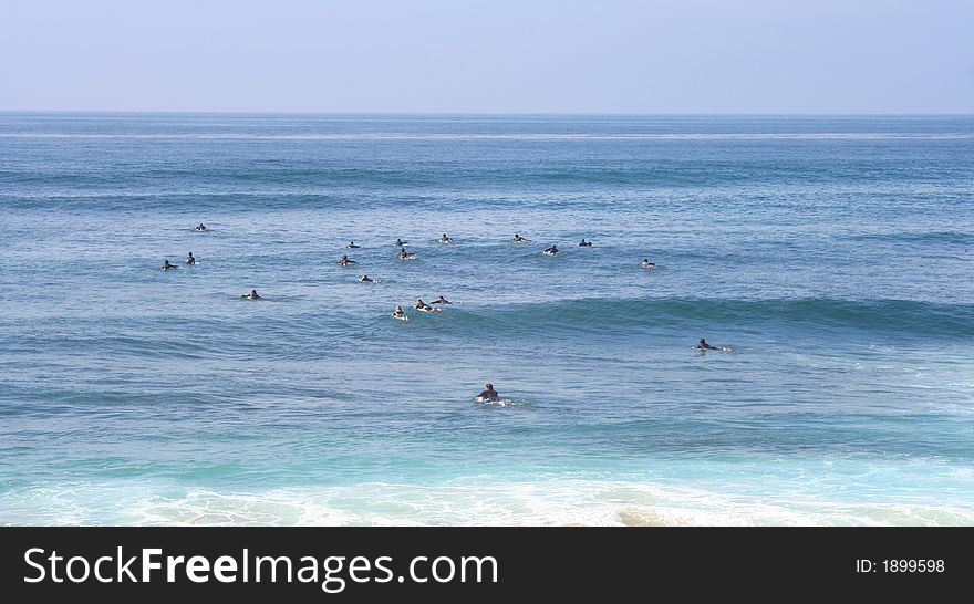 This is a landscape photo of surfers at Windandsea Beach in La Jolla, California. This is a landscape photo of surfers at Windandsea Beach in La Jolla, California