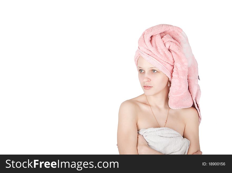 Portrait of woman wrapped towel isolated