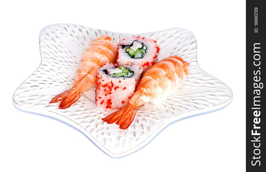 Sushi and California Maki on a plate over white background