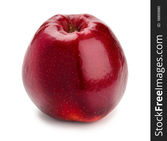 Ripe and juicy red apple shank downwards isolated