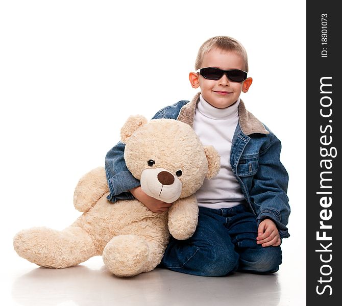 Cute little boy posing isolated on white