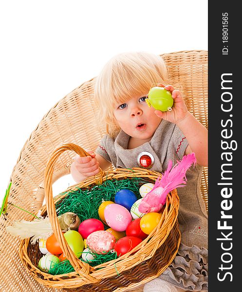 Blonde haires little girl with easter eggs