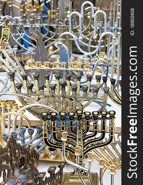 Background of the  retro and antique traditional Jewish holiday candlesticks. Jerusalem flea market. Background of the  retro and antique traditional Jewish holiday candlesticks. Jerusalem flea market.