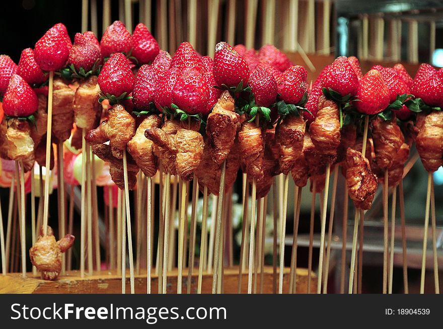 Fresh and delicious strawberries on sticks