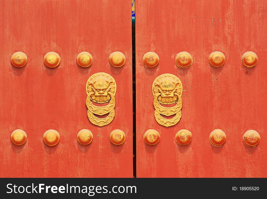 Chinese red door with two lions/dragons head. Chinese red door with two lions/dragons head