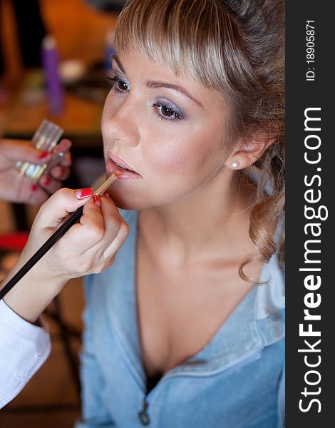 Process of preparing a model make-up. Process of preparing a model make-up