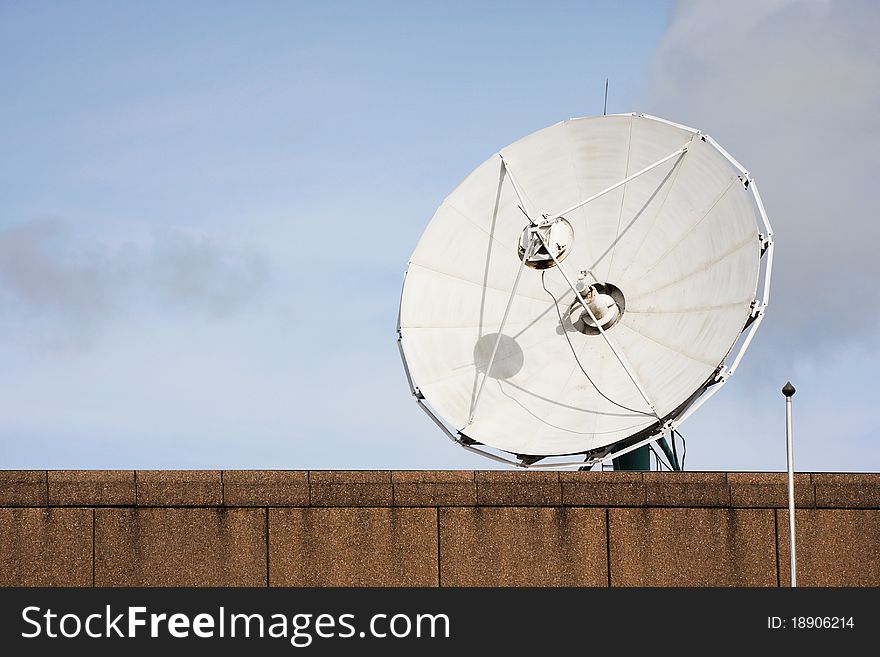 Broadcaster or transmitter center and telecommunication satelite. Broadcaster or transmitter center and telecommunication satelite