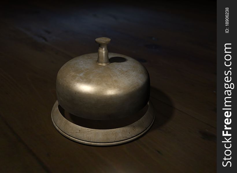 Computer generated reception bell on a dark desk